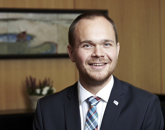 State Secretary Amund Drønen Ringdal works on a white paper on growth in Norwegian aquaculture. Picture NF Dep